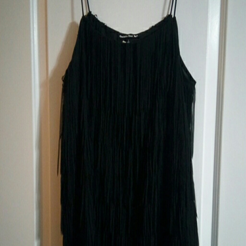 Adorable black top with fringe